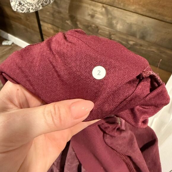 Heathered Pink Relaxed Hoodie with Long Sleeves and Ribbed Details​ - Picture 4 of 7